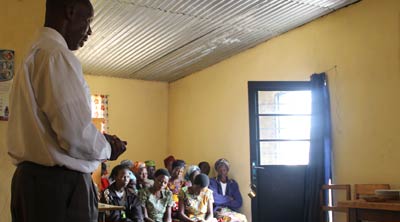 Clients Praying in Rwanda