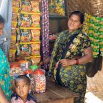 Divya serves customers at her store attached to her home